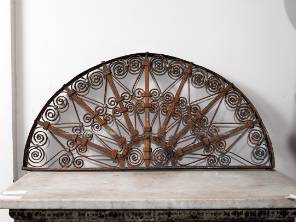 A French 19th Century Wrought Iron Over Door